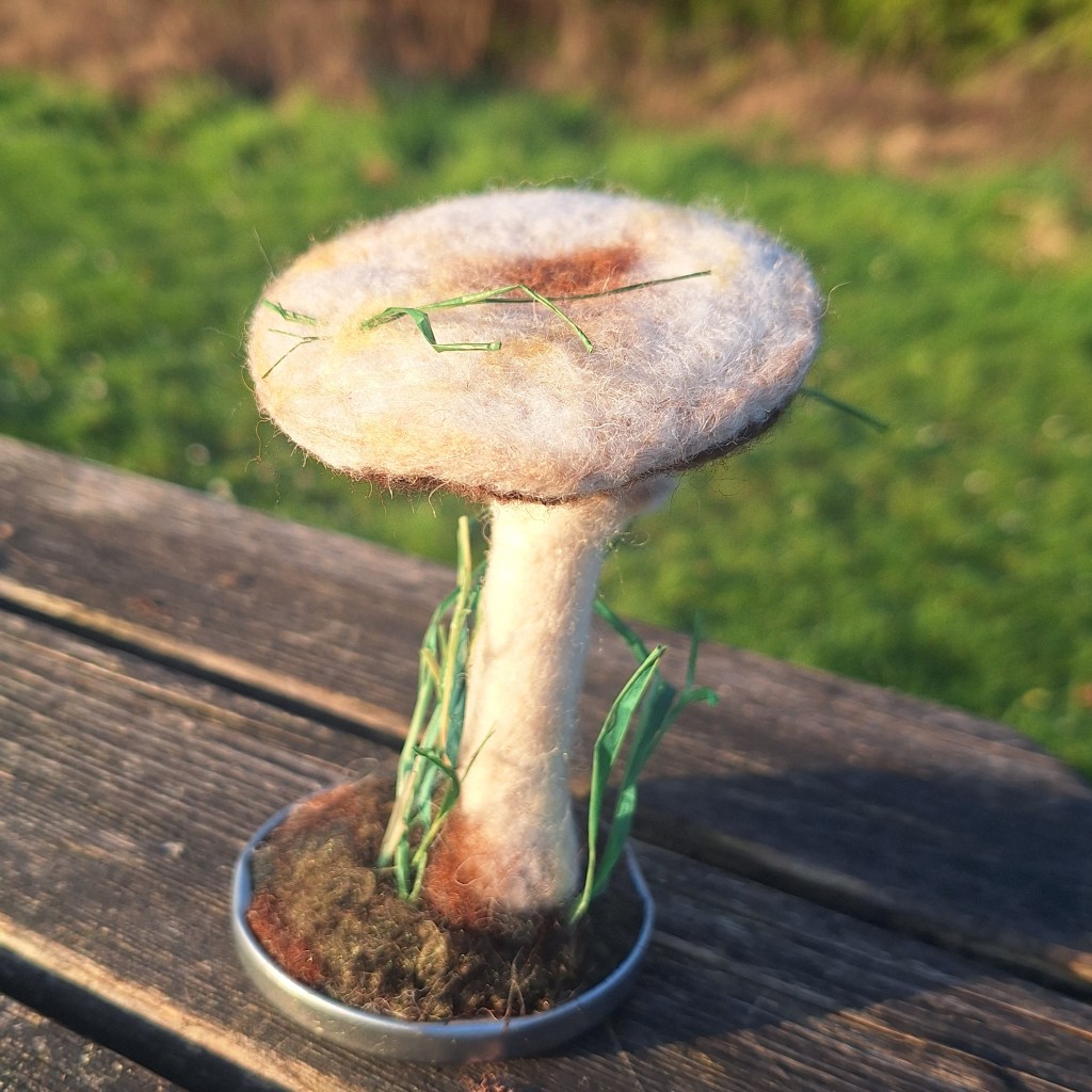 Needle-felted horse mushroom